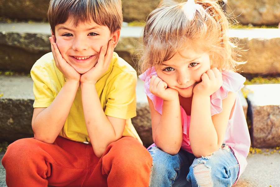 little boy and girl smiling