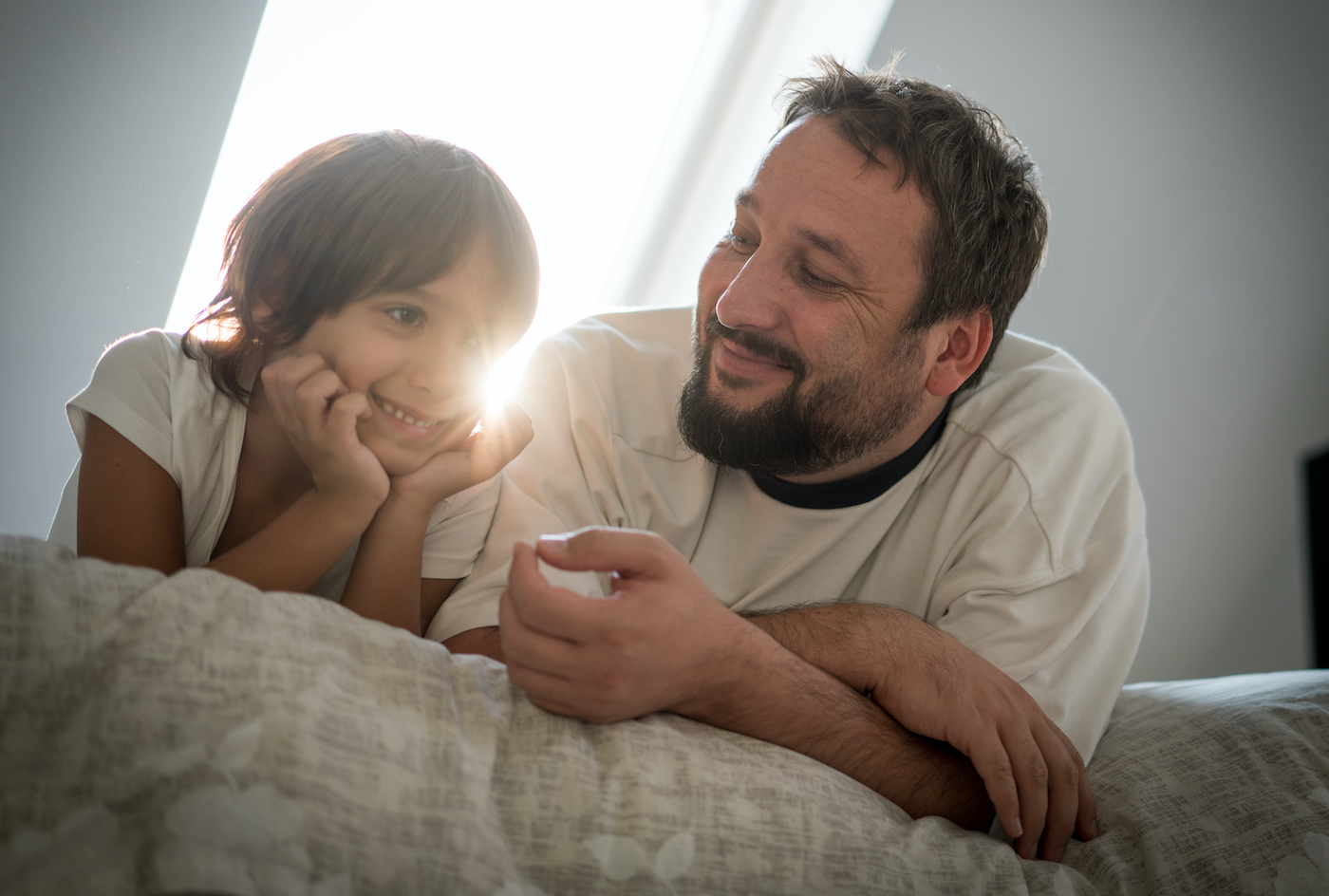 Father teaching son about verbal ability