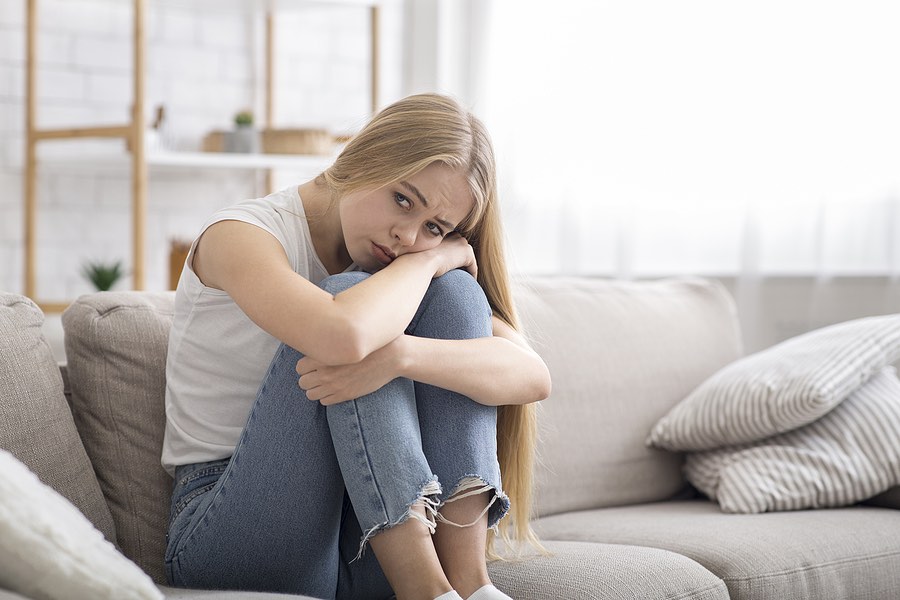 Lonely Sad Young Woman Sitting At Home Alone, Suffering From Loneliness, Copy Space